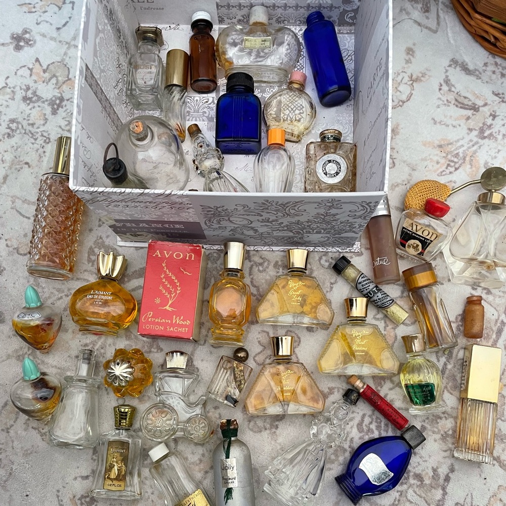 Avon Women's Fragrance Collection with Gold and Blue Bottles